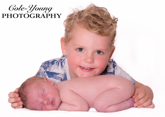 newborn photoshoot with brother